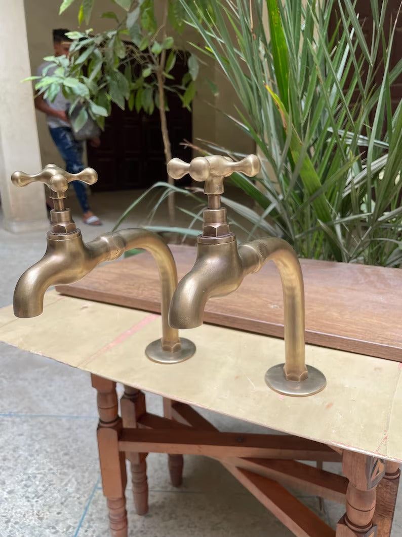 Two Basin faucet in unlacquered brass
