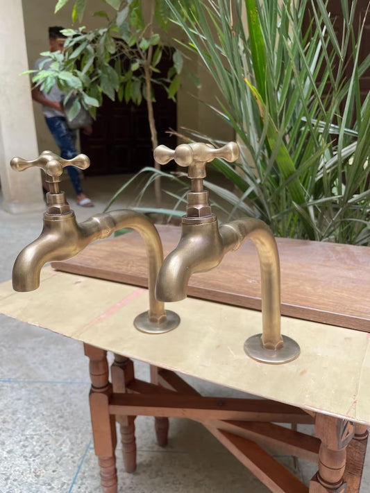Two Basin faucet in unlacquered brass