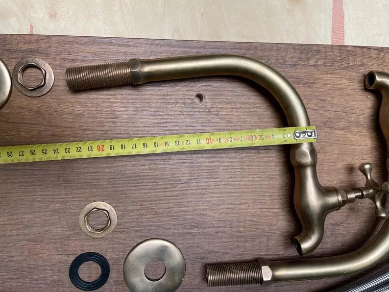 Two Basin faucet in unlacquered brass