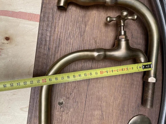 Two Basin faucet in unlacquered brass