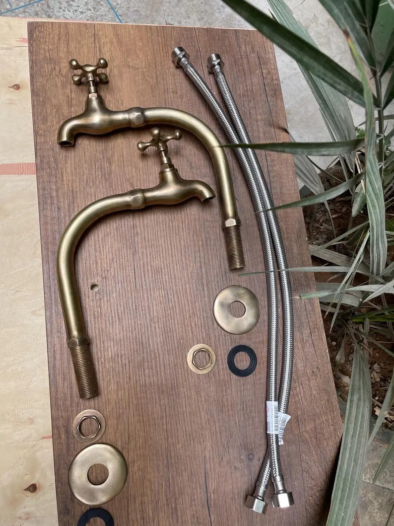 Two Basin faucet in unlacquered brass