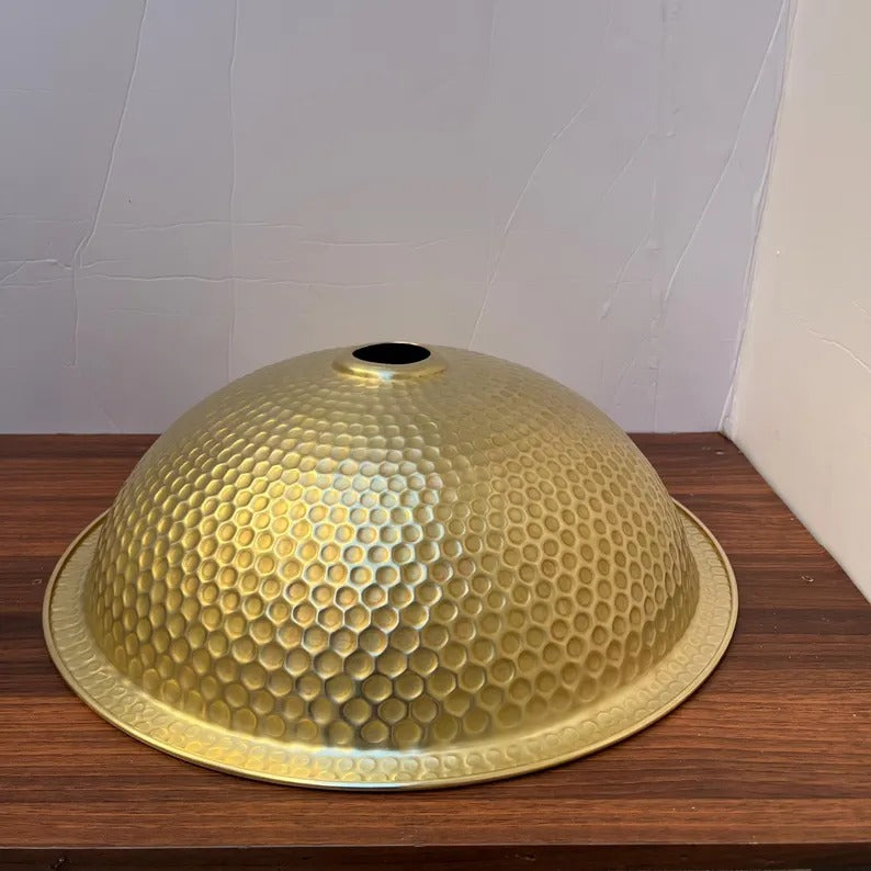 Handmade brass sink with a hammered finish, ideal for bathroom or kitchen upgrade.