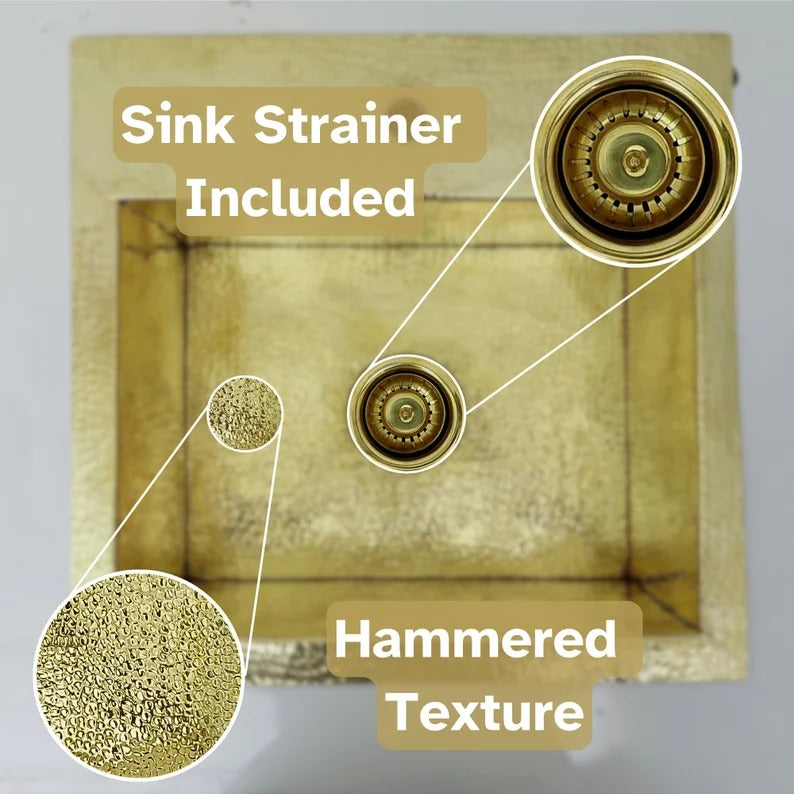Overview of the hammered texture and sink strainer of an unlacquered solid brass sink.