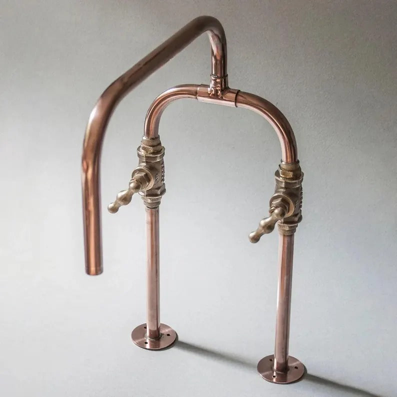 Handmade pure copper deck mount faucet with solid brass valves and dual handles, ideal for farmhouse kitchens.